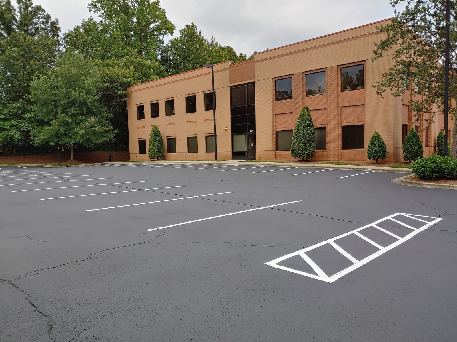 Raleigh office park after sealcoat and stripe